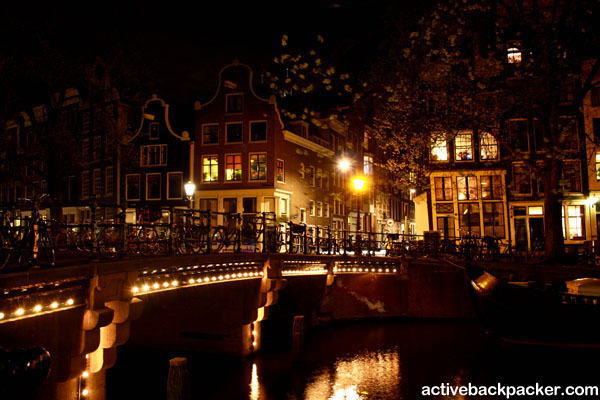 Amsterdam Canal Lit Up At Night